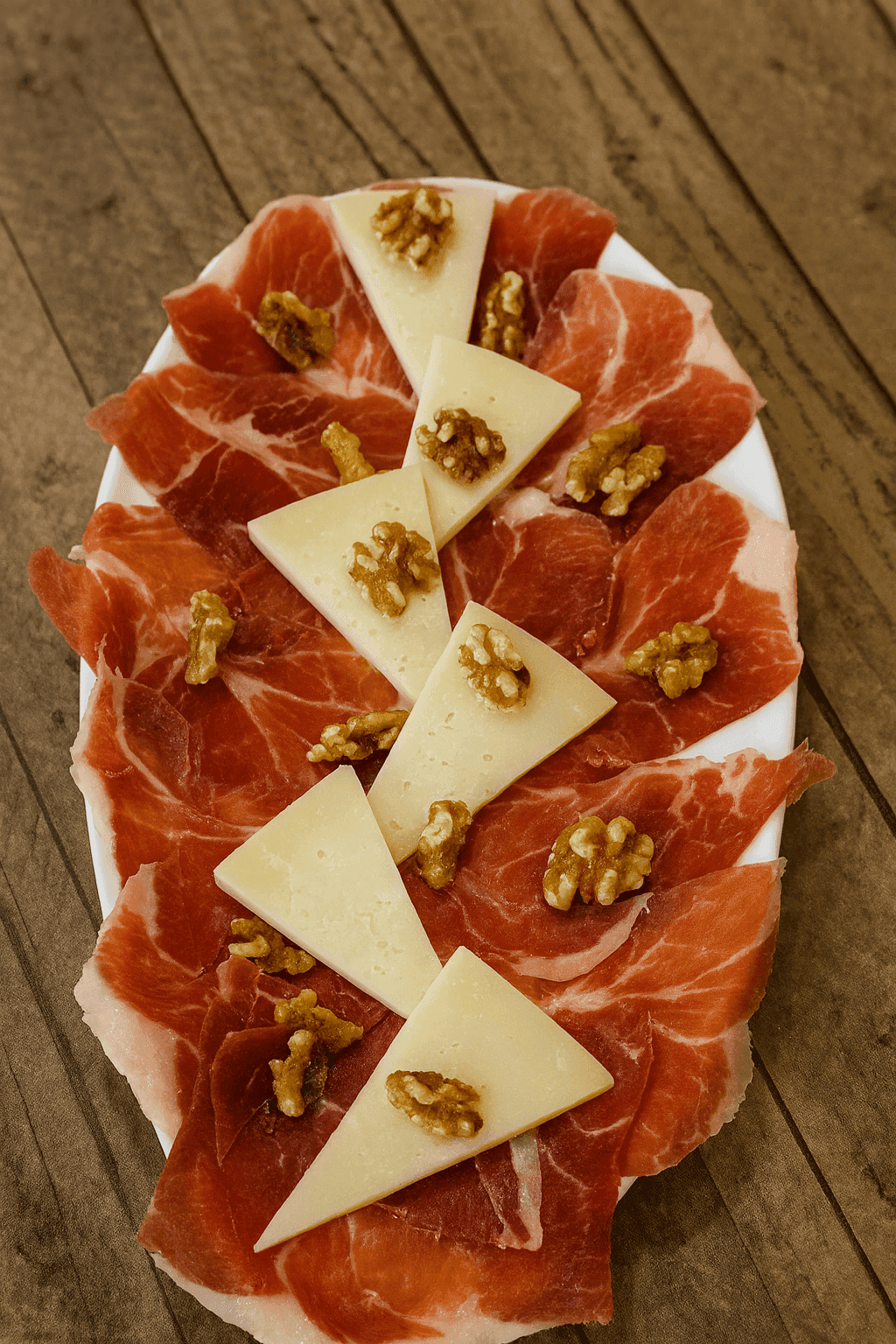 Tabla de jamón ibérico con queso curado